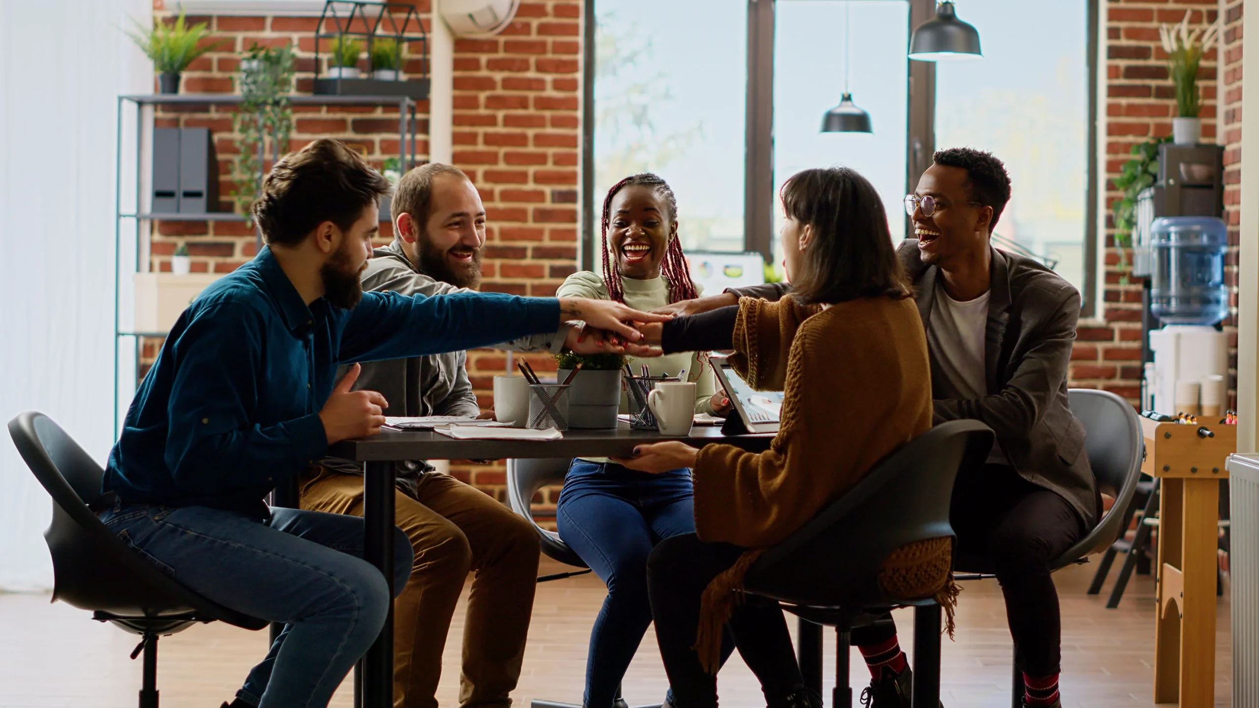 Diverse team of workers have a meeting