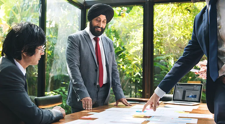 Man in turban at meeting